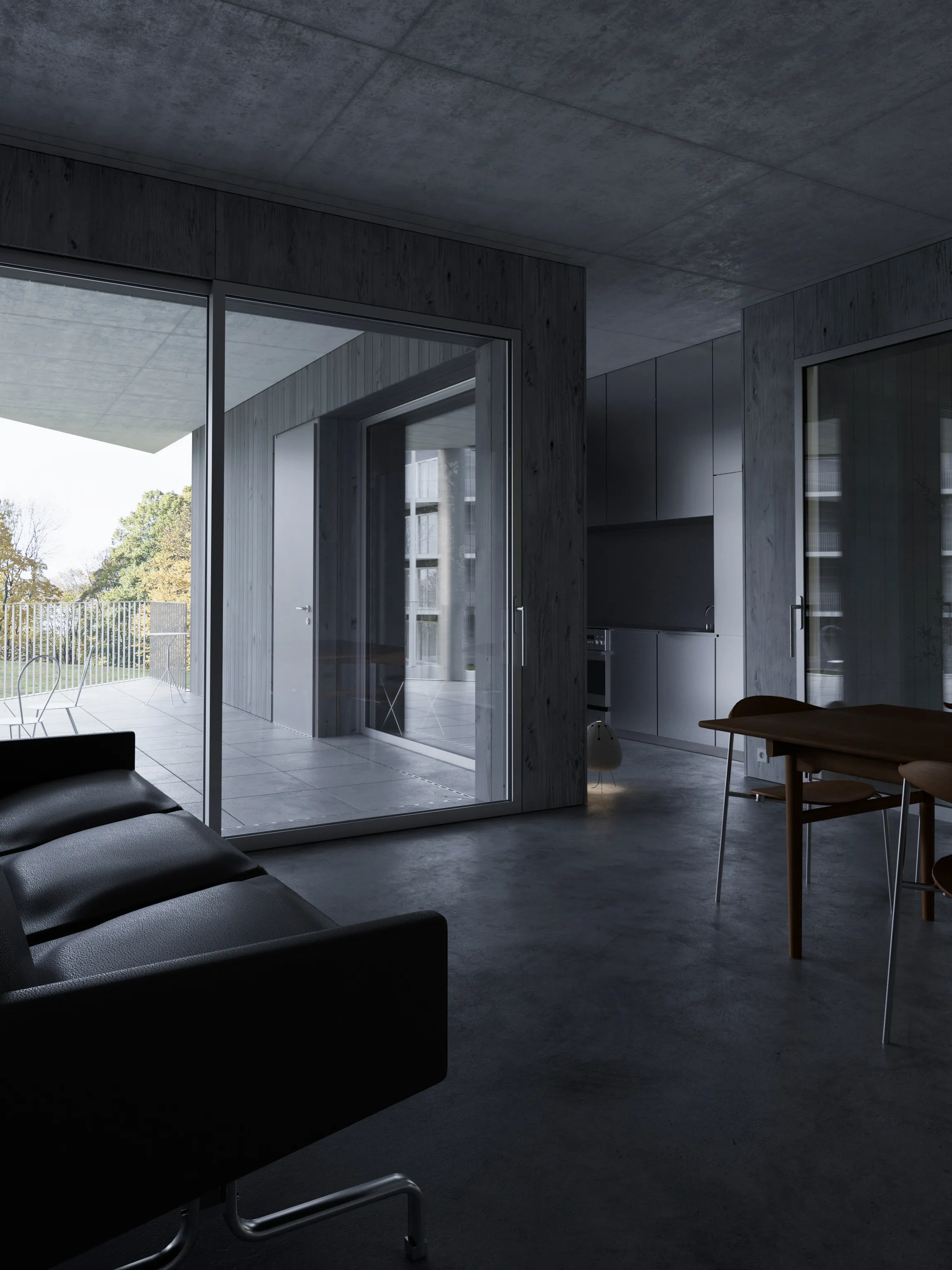 Interior of the living room combined with the dining room of a social building for TBS in Katowice on Kosmiczna Street. Living room space directly connected to outdoor terraces.