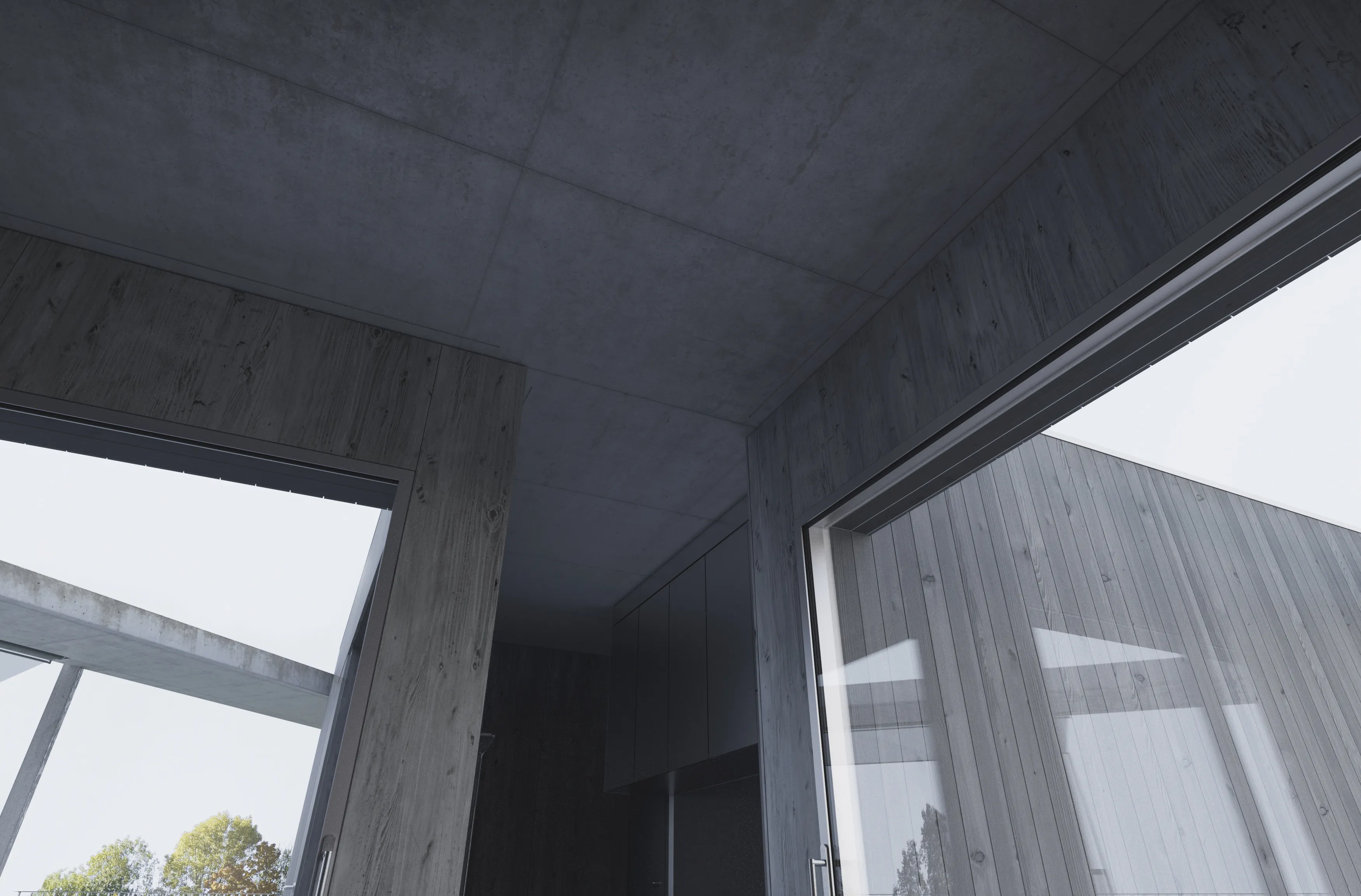 Interior of the living room combined with the kitchen of a social building for TBS in Katowice on Kosmiczna Street. Living room space directly connected to outdoor terraces.